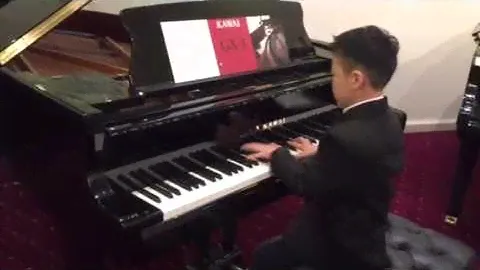 Young nine years old genius plays well on Kawai GX3 grand p
